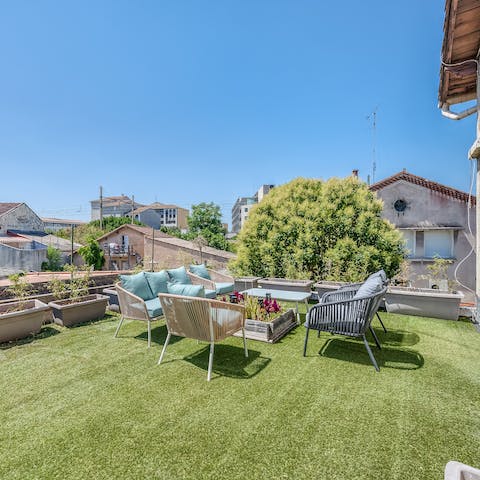 Sit out on the roof terrace to enjoy a view of Avignon with a glass of wine