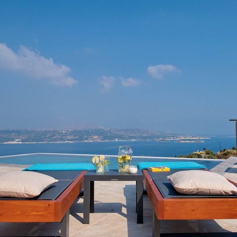 Lay back on a sun lounger and enjoy the gorgeous sea views