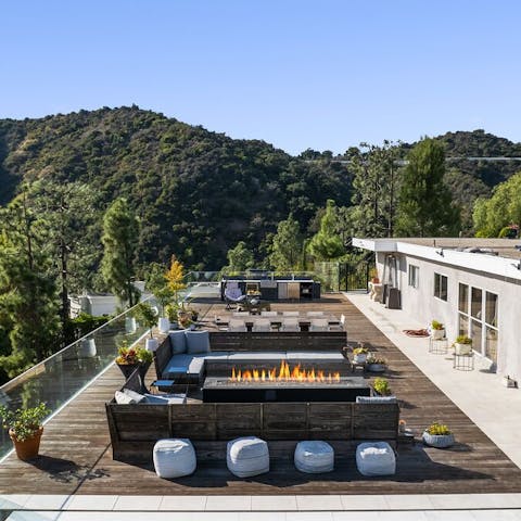 Share cocktails around the outdoor fire while admiring the views