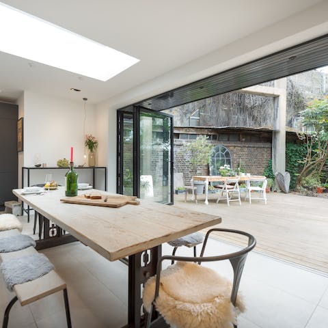 Open the bi-fold doors to let in some fresh air while you have brunch