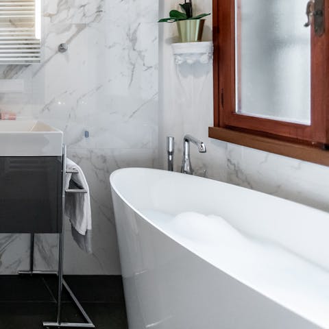 Unwind with a soak in the bath tub