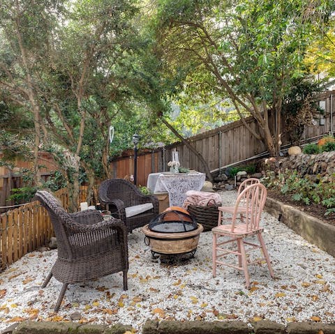 Light up the firepit in the home's huge garden and shoot the breeze