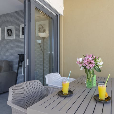 Serve up alfresco meals on the private balcony terrace after a day of discovering the Adriatic coastline
