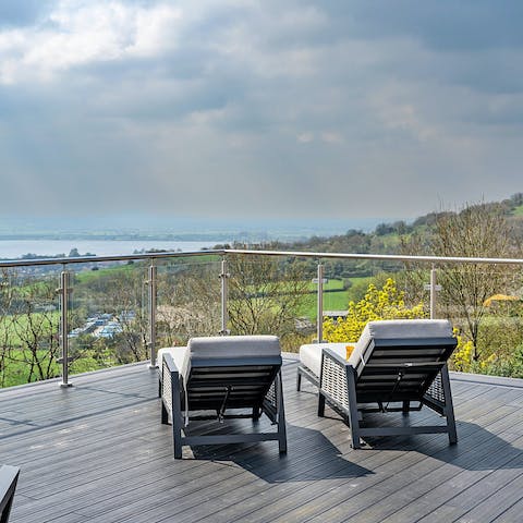 Take in glorious Cheddar Valley views from the hot tub