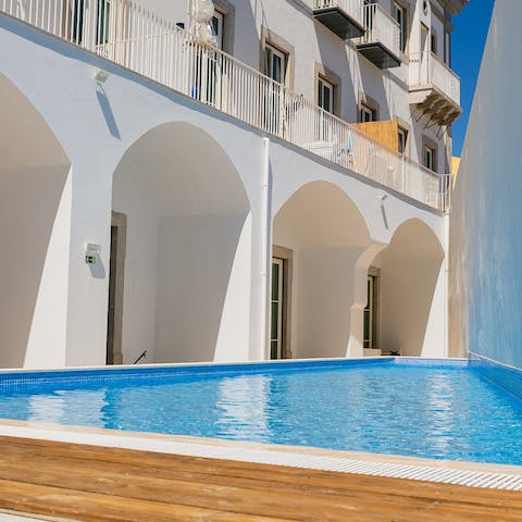 Escape the Algarve heat in the communal pool