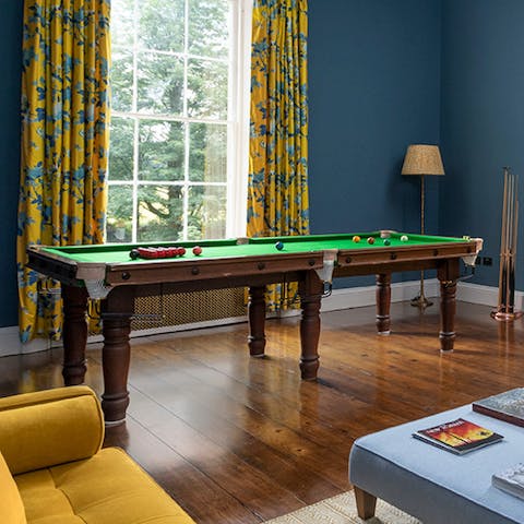 Challenge your loved ones to a game of snooker