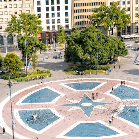 Enjoy some retail therapy at the Plaça de Catalunya, a short walk away