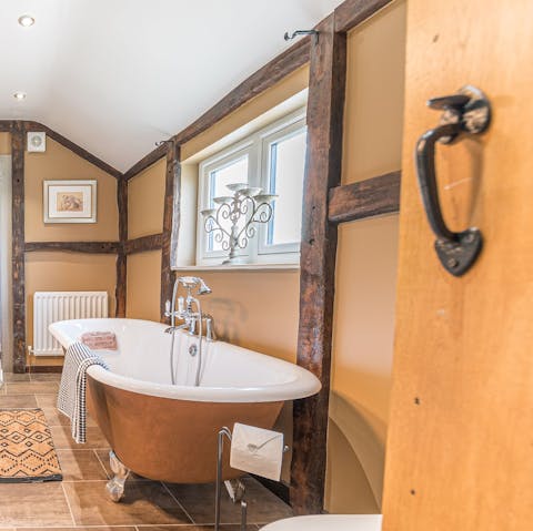 Relax into the charming roll top bath for a little quiet time 