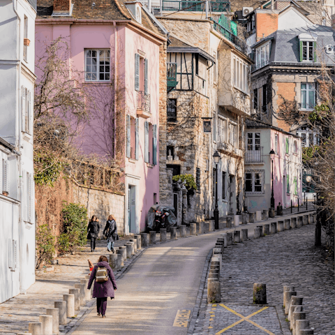 Wander around the colourful, cobbled streets of Montmartre, less than ten minutes away