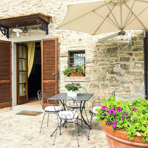 Enjoy espresso and biscotti out on the private terrace