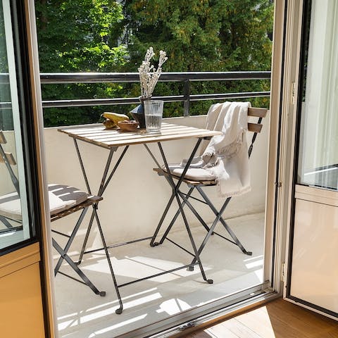 Tuck into French pastries for breakfast on the private balcony