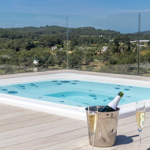 Take in the Ibiza countryside views from the Jacuzzi