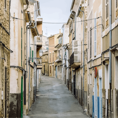 Drive 3km into Artà to explore the narrow streets and dine on tapas