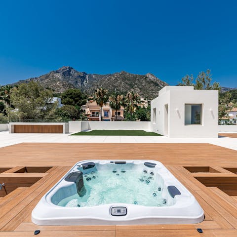 Relax after a day of exploring in the private hot tub