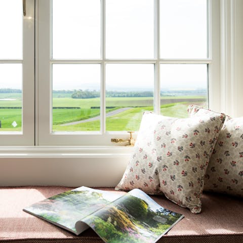 Curl up with a good book on the panoramic window seats