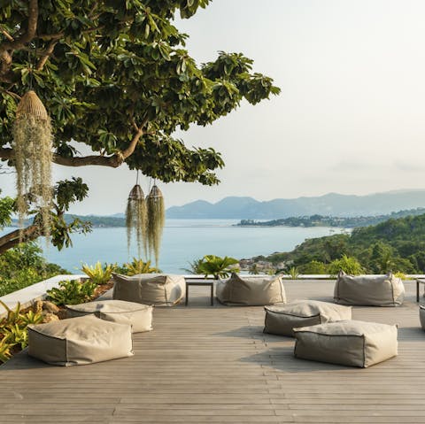 Spend afternoons lounging in the terrace beanbags overlooking the cove