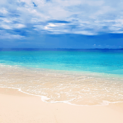 Pass warm days on the golden sands of Cheong Mon Beach, only minutes away