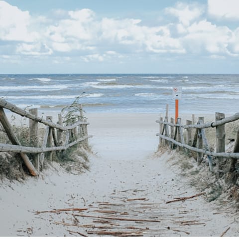 Take the twenty-minute walk to the sandy beach at De Cocksdorp
