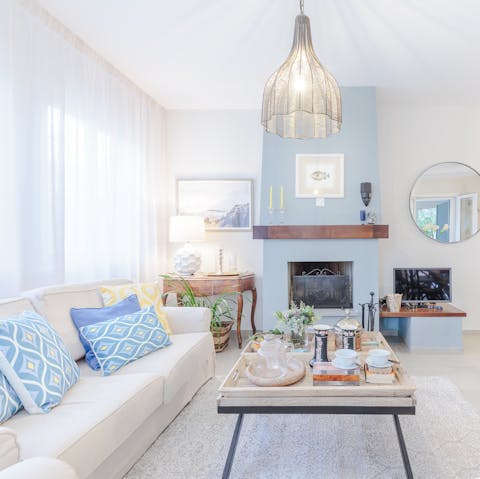 Make yourself at home in the coastal-inspired living area