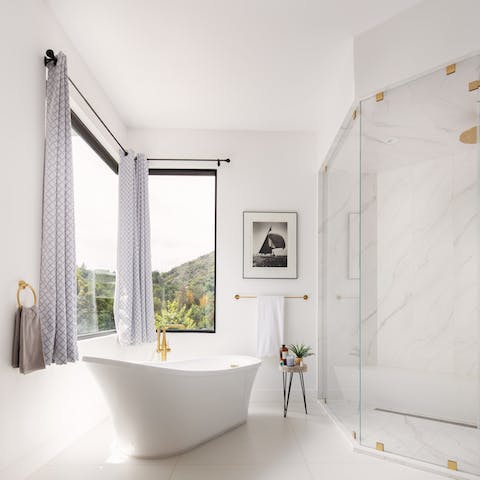 Indulge in a long soak in the freestanding bathtub