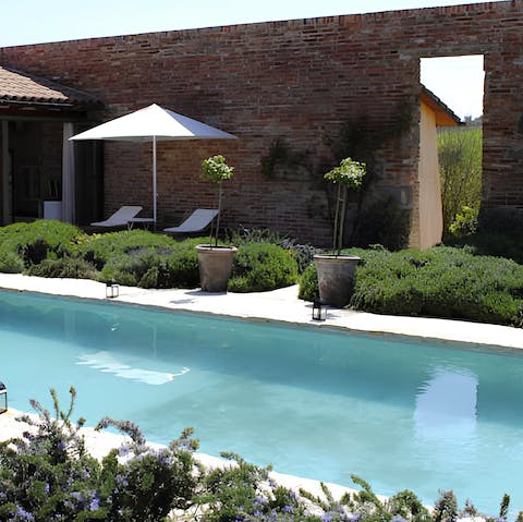 Lounge by the private pool and soak up the Italian sun 
