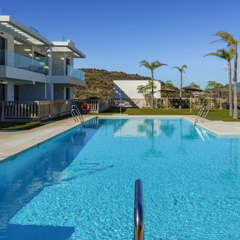 Stroll down to the communal swimming pool and splash in the sunshine