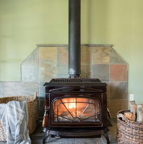 Cosy up next to the rustic wood burner with a good book and some hot coco