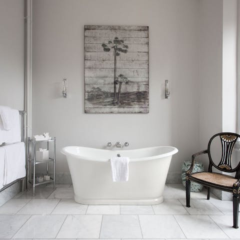 Take a decadent soak in one of the free-standing bathtubs