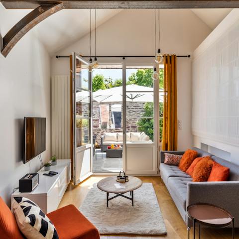 Gather in your comfortable living area as you plan for a day of sightseeing in Rennes