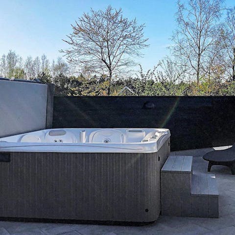 Treat your senses to a long soak in the outdoor spa as the sun sets