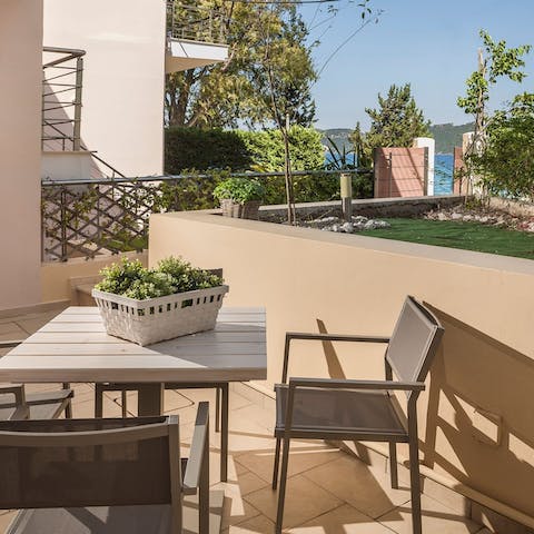 Enjoy the sunshine on your private balcony overlooking the garden