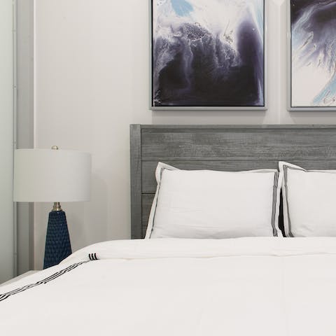 Get some well-deserved rest in the comfortable bed after exploring the city