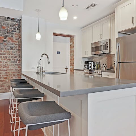 Pull up a chair and enjoy breakfast in the modern kitchen