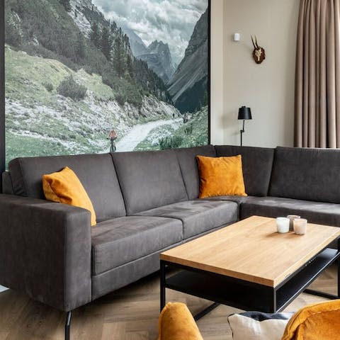 Sit back and unwind with a movie in the inviting and cosy living room