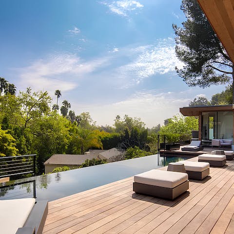 Find peace and relaxation while lounging by the pool
