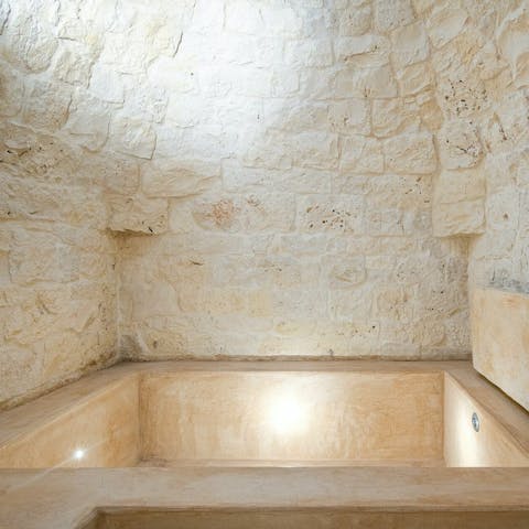 Sink into the built-in bathtub for a relaxing soak