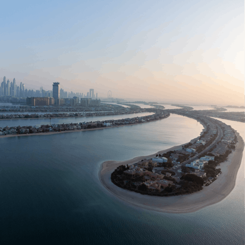 Stay on the iconic Palm Jumeirah and sample the upmarket restaurants