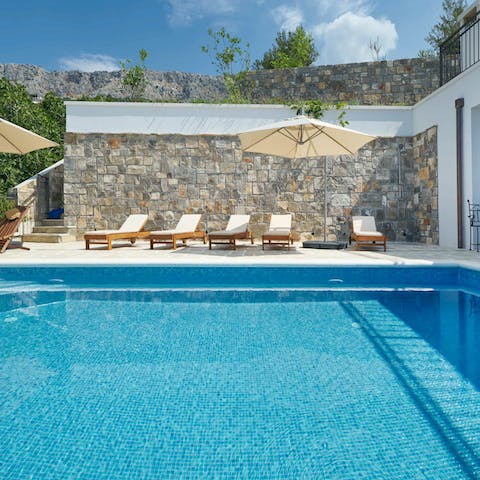 Refresh with a dip in the sparkling heated pool 