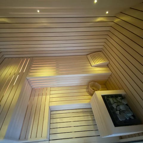 Soothe your muscles in the private dry sauna