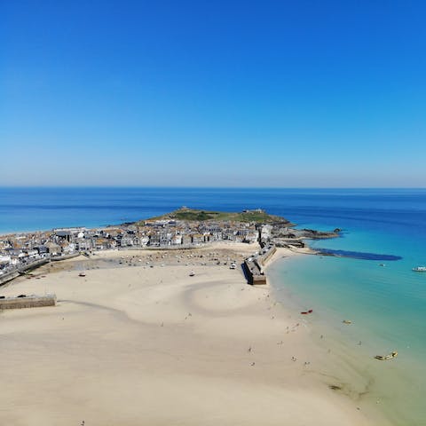 Visit the picturesque fishing harbour and seaside town of St Ives, just a short ten-minute drive away