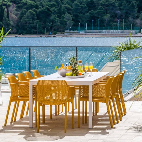 Enjoy dinner with a view in the stylish outdoor dining area