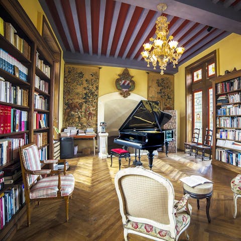 Embrace the noble history of the home in the library and piano room