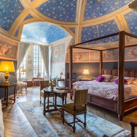 Sleep in four-poster beds beneath hand-painted ceilings