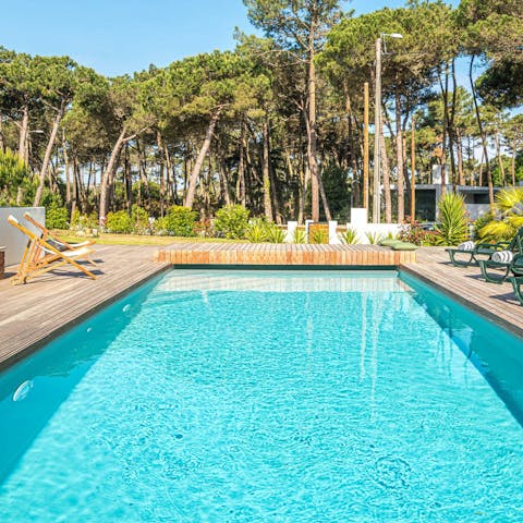 Escape the Lisbon heat with a float in the heated private pool