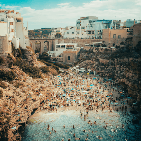 Take a day trip to Polignano a Mare, 10km away