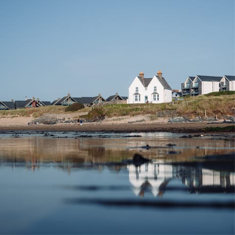 Drive fifteen minutes to Anglesey's stunning coast and enjoy a walk along the shore