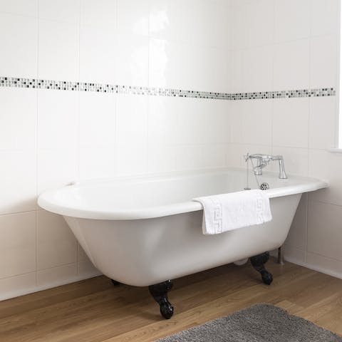 Have a soak in the roll top bath after a long walk on the beach