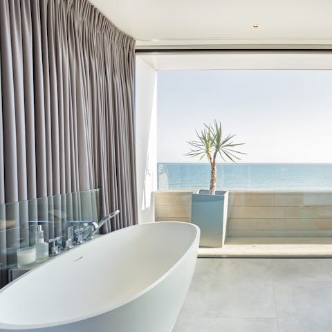 Take a long soak in the main suite's panoramic bath