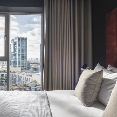 Wake up to knockout city vistas from the bedroom