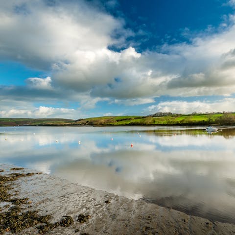 Walk along the River Teifi until you reach Poppit Sands Beach in half an hour